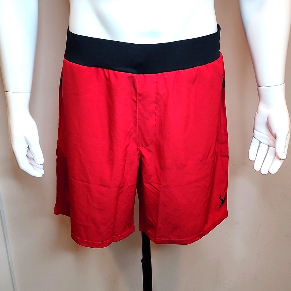 SPYDER ACTIVE MENS SWIMSUIT, THE SIZE IS LARGE, THE COLOR ID DEEP RED